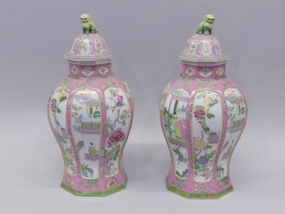 Pair of covered porcelain vases in the famille...