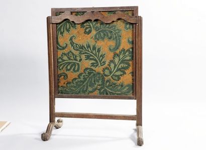 Mantel screen in molded and carved walnut...