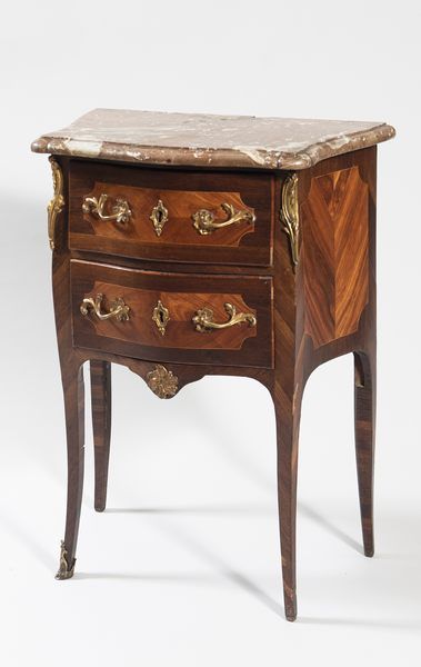 Small chest of drawers with curved front...