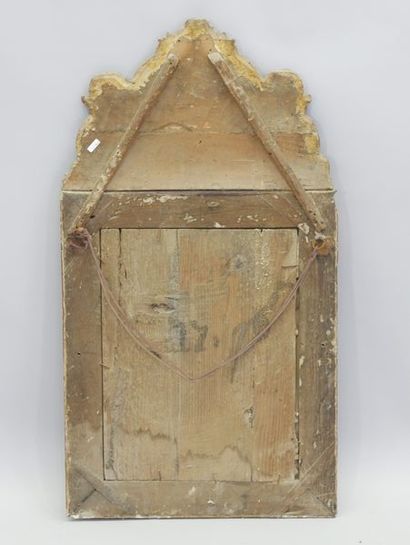 Mirror in a gilded and carved wood frame,...