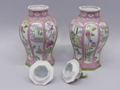 Pair of covered porcelain vases in the famille...