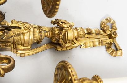 Set comprising 
- pair of chased and gilt...