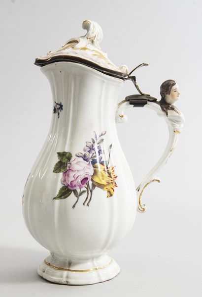Beautiful covered pitcher with twisted ribs...