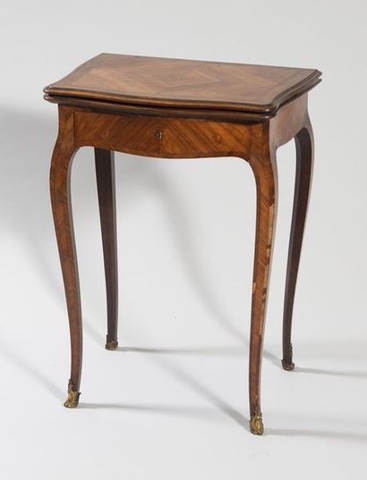 Small veneered games table with folding top...