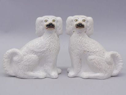Pair of ceramic Staffordshire dogs. England,...