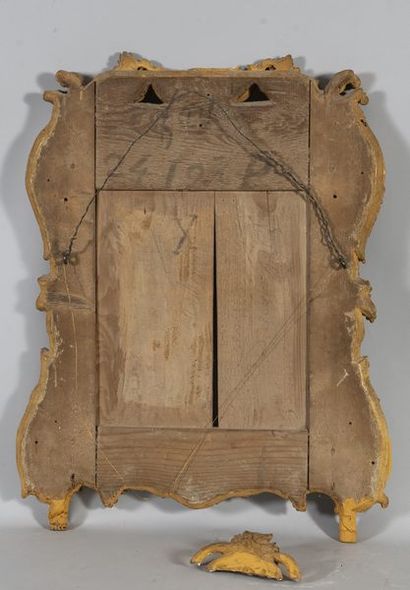Miroir à parcloses dans un encadrement en...