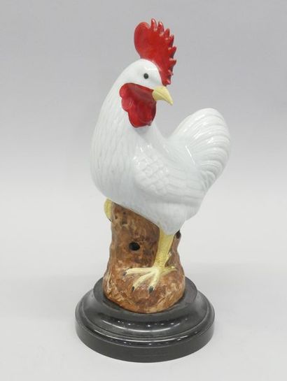 Polychrome porcelain rooster on marble swivel...