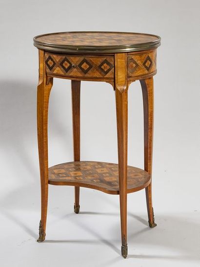 Oval lounge table in veneered wood and marquetry...