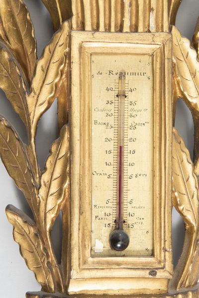 Baromètre, thermomètre en bois sculpté et...
