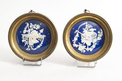 In bronze medallions, 2 mother-of-pearl cut-outs...