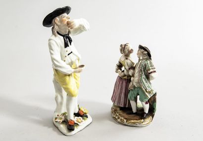Homme prisant en porcelaine polychrome.
haut...