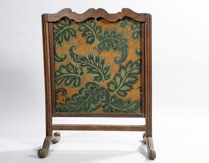 Mantel screen in molded and carved walnut...