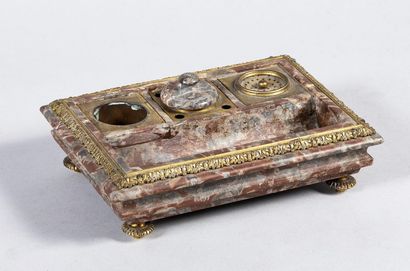White-veined pink marble inkwell with molded...