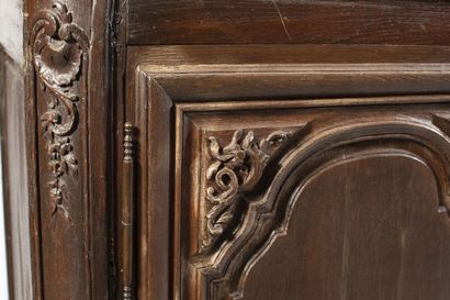 Oak paneled sideboard. It opens to 2 molded...