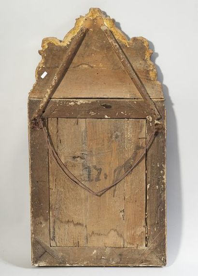 Mirror in a gilded and carved wood frame,...