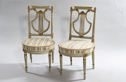 2 chairs in gold rechampi lacquered wood,...