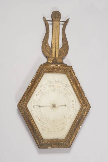 Thermomètre - baromètre en bois dédoré, modèle...
