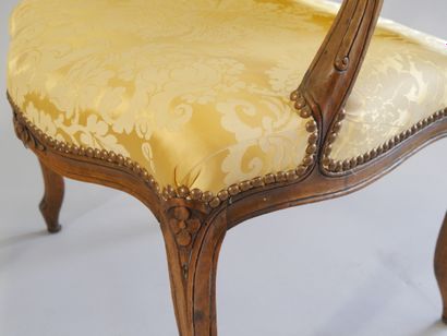 Pair of flat-back armchairs in carved and...