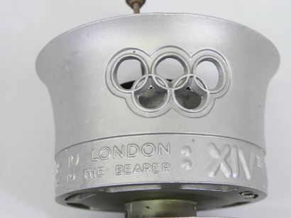 Official torch of the XIV Summer Olympic...