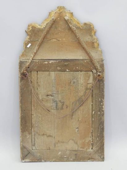 Mirror in a gilded and carved wood frame,...
