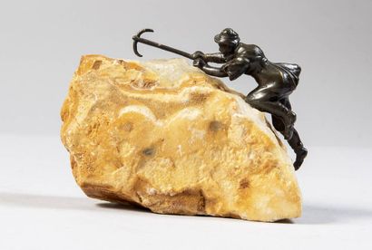 Bronze and stone statuette of a mountaineer...