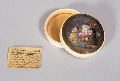Circular ivory box with movable lid. On the...
