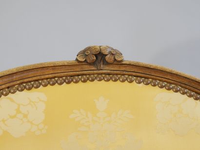 Pair of flat-back armchairs in carved and...