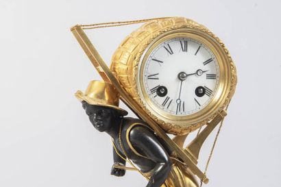 Chased and gilt bronze clock representing...