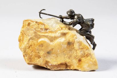 Bronze and stone statuette of a mountaineer...
