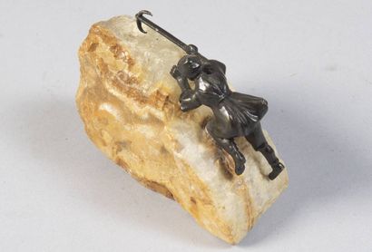 Bronze and stone statuette of a mountaineer...