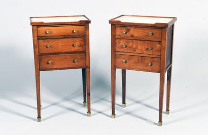 Pair of cherrywood bedside cabinets opening...
