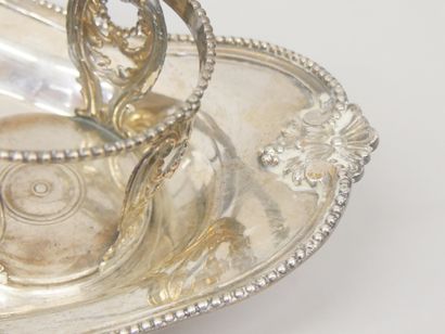Silver navette-shaped oil and vinegar cruet...