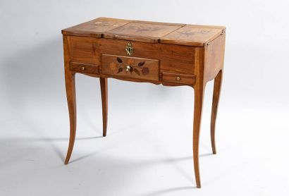 Walnut 3-leaf vanity inlaid with bouquets...
