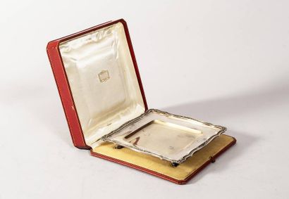 In an imitation morocco CARTIER case, silver...