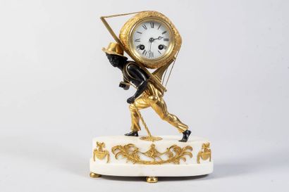 Chased and gilt bronze clock representing...
