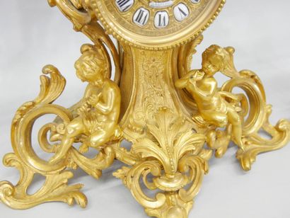Rococo style ormolu mantel with cherubs (2...
