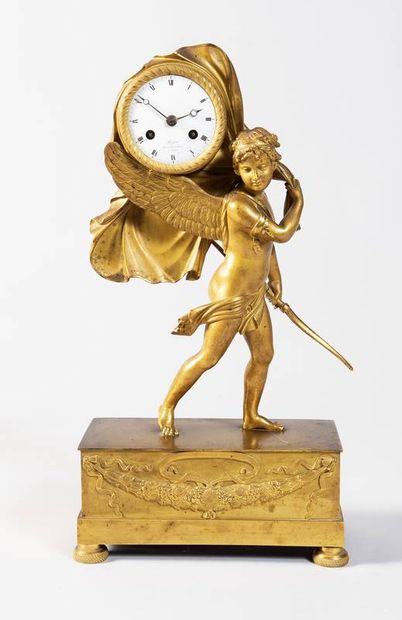 Romantic ormolu clock featuring a draped...
