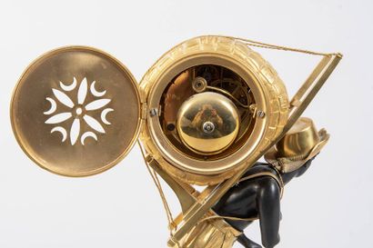 Chased and gilt bronze clock representing...