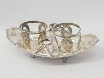 Silver navette-shaped oil and vinegar cruet...