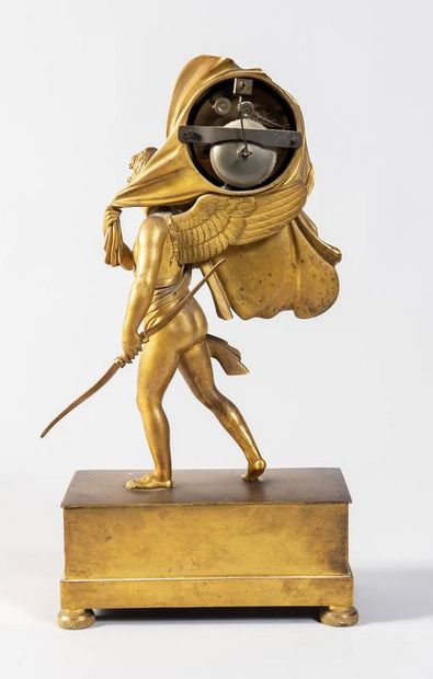 Romantic ormolu clock featuring a draped...