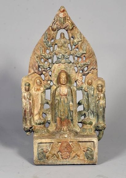 CHINA Limestone stele depicting standing...