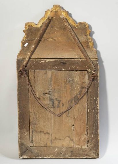 Mirror in a gilded and carved wood frame,...