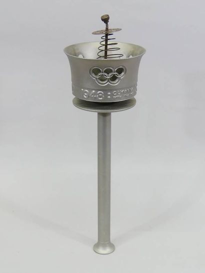 Official torch of the XIV Summer Olympic...