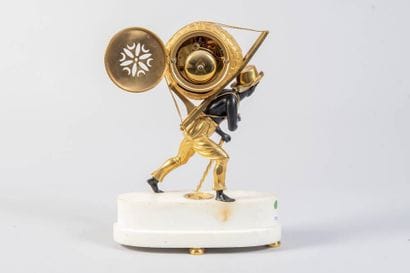 Chased and gilt bronze clock representing...