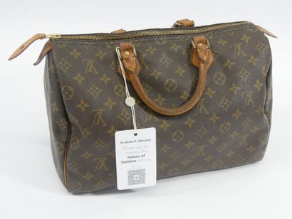 Louis VUITTON
Modèle SPEEDY
Sac porté main...