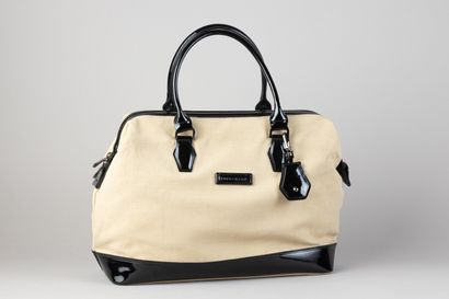 LONGCHAMP
Sac à main en cuir deux tons beige...