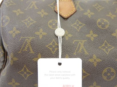 Louis VUITTON
Modèle SPEEDY
Sac porté main...