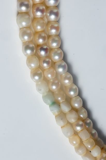 Three-row necklace of white cultured pearls,...