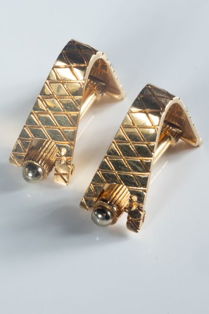 Paire de boutons manchettes forme étriers...