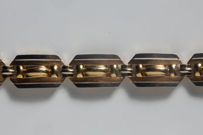 Bracelet en or jaune et or gris (750 millièmes)...